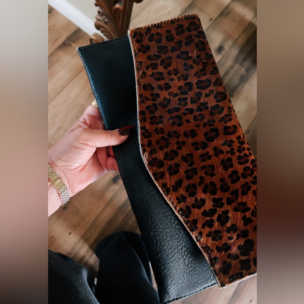 Faux-fur Leopard and black clutch. Perfect for date nights or holiday parties.